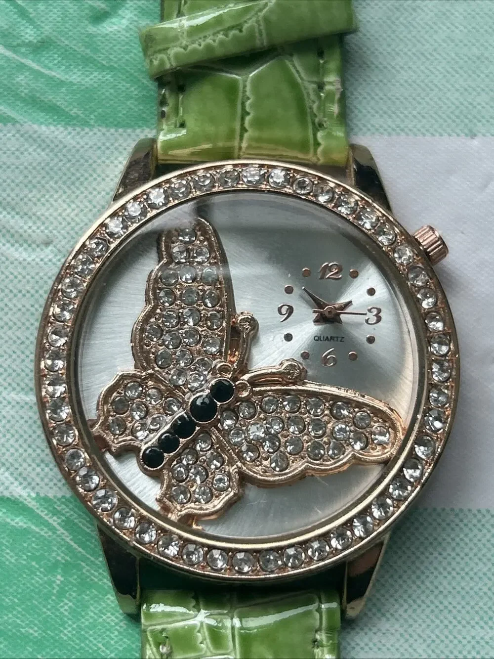 Women’s Rose Gold Tone Butterfly Dial Quartz Watch